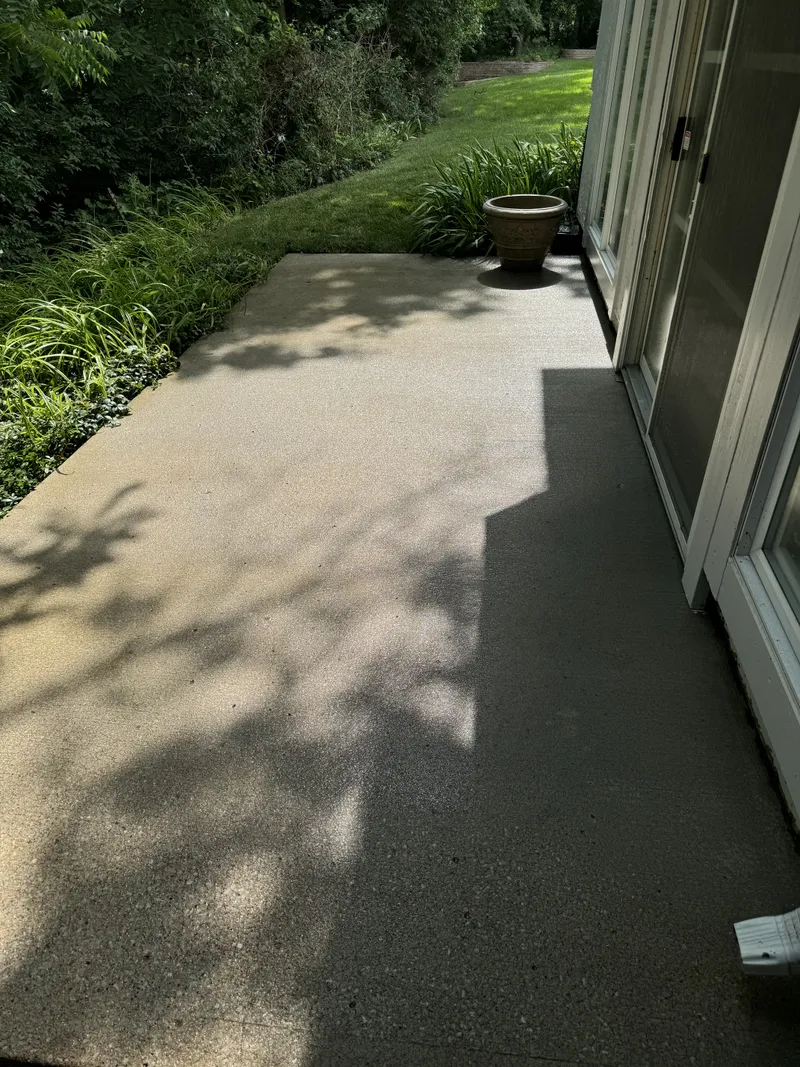 Pressure washing service by Sparkle Window Cleaners — Clean concrete after pressure washing.