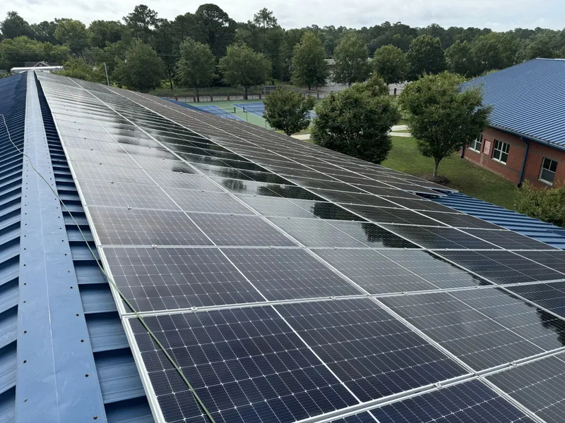 Solar panel cleaning by Sparkle Window Cleaners — Wide, freshly cleaned solar array